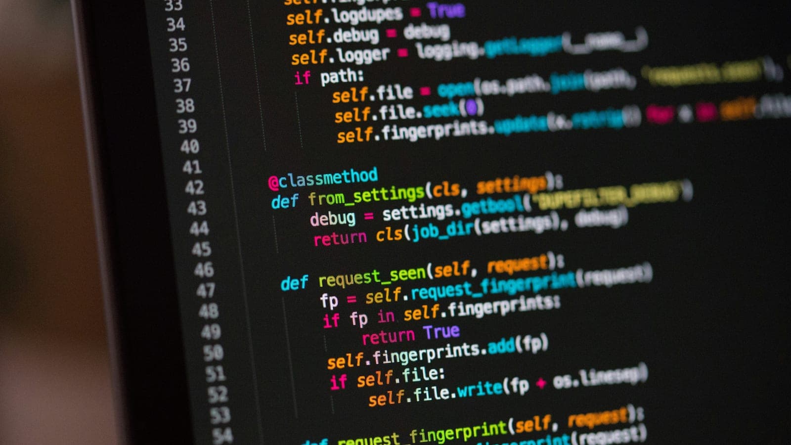 Close-up of coloured Python code on a computer screen.